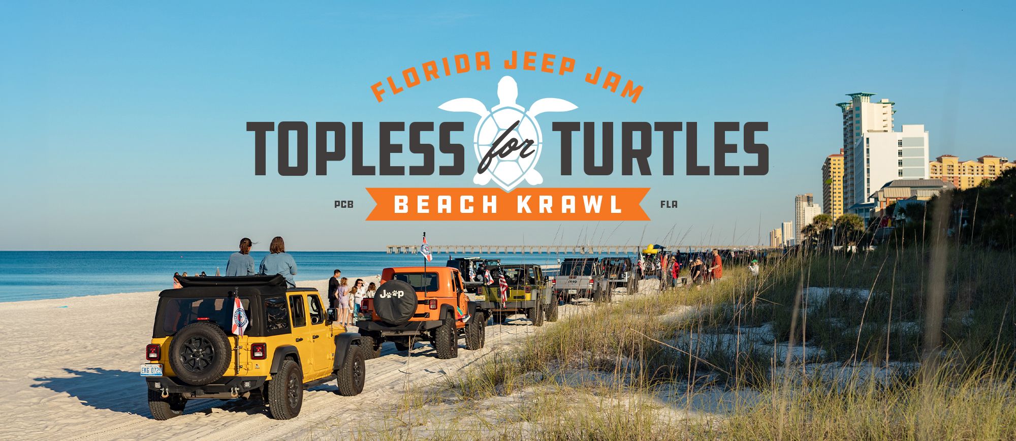 Promotional banner over a line of Jeeps parked on a sunny Florida beach, reading 'Topless for Turtles' for the Florida Jeep Jam.